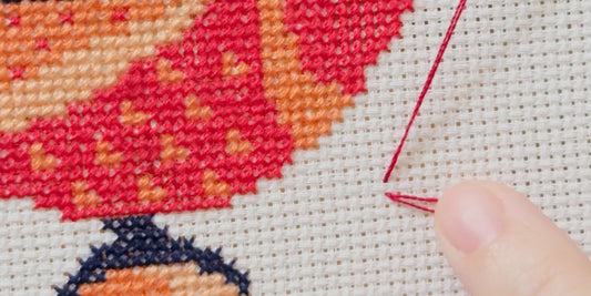 Starting cross stitching on the front side